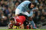 tevez-elbow-deep-in-ferdinand-595x385_display_image (1).jpg